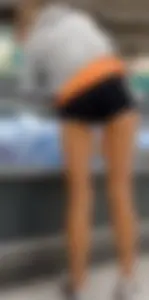 Teen in short shorts showing ass cheeks