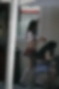 Two sexy Tilted Kilt employees showing cleavage and cheeks