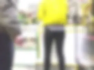 Legs in Leather Pants at the Store Closeup Photos