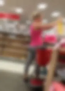 Blonde milf at Target in grey striped leggings with a nice ass