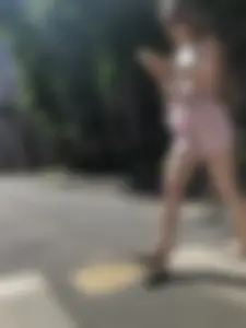 Cute candid girl in pink shorts street photos