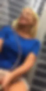 Blonde lady with big boobs showing pokies