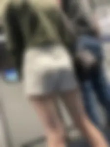 Subway train and subway station creepshots of a candid girl wearing shorts with pale skinny legs