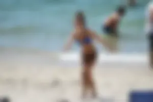Sexy ass girl with a perfect body in her bikini on the beach