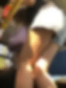 A Hot Candid Girl in Blue Denim Shorts Sitting in a Public Bus, Closeups of Her Legs And Upshorts Creepshot