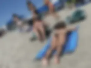 Hot candid lying on the beach creeps
