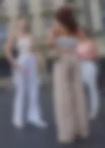Long blonde braless in a white outfit (many pictures)