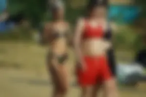 Group of Girls in Swimsuits Walking on the Beach Candid Photo Gallery