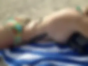 Cute young candid girl lying on the beach creepshots, closeups of her ass