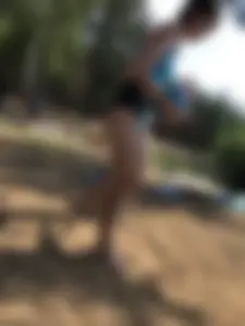 Wet Girls in Swimsuits Walking Towards Water at a Lake Beach Photo Series