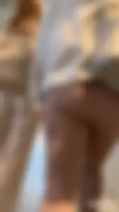 Tall curlyhead college girl in skin coloured leggings