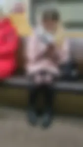 Cute Girl in Black Pantyhose Sitting in the Subway Train