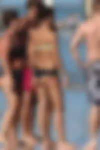 Beach girl out in a bikini with a nice round big booty