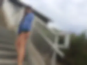 Blue thong beach babe walking up the stairs