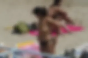 Girls on a nude beach in Sitges, Spain