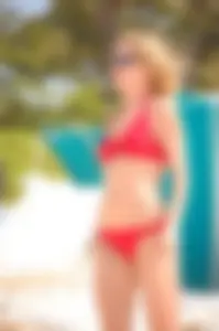 Bunch of sexy girls and milfs in bikinis at the beach