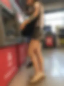 Candid Girl With Nice Skinny Legs in Shorts at the ATM Photos