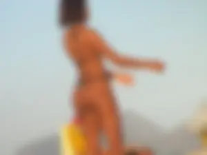 Sexy morena babe in thong bikini with a great ass