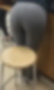 Chubby Booty and Legs in Grey Tights Closeup Photo at a Cafe