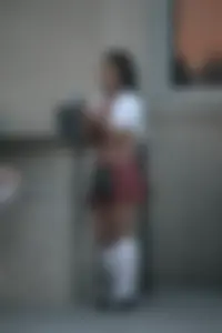 Two sexy Tilted Kilt employees showing cleavage and cheeks