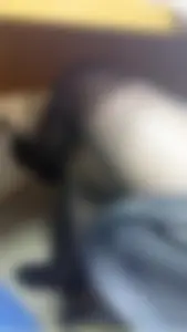 Closeup of crossed legs in black pantyhose, hot candid office girl