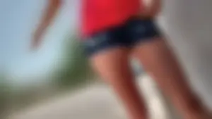 Friend in short shorts showing cheeks and some cleavage