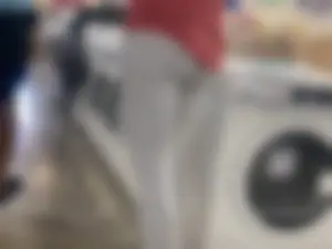 Closeup of a ladies crotch and booty in white leggings