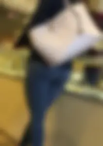 Brunette jewelry shopping in leggings with a nice ass