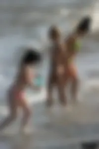 Beach voyeur girls in bikinis, thongs and topless