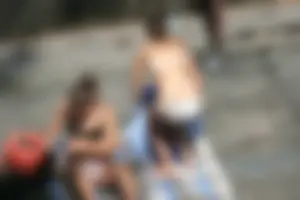 Two teens stripping and going topless to tan