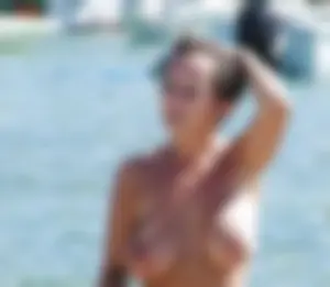 Nude and almost naked girls at the beach