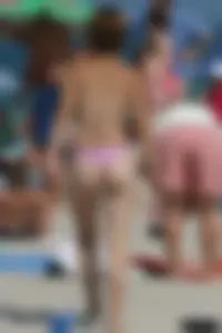 Beach voyeur girls in bikinis, thongs and topless