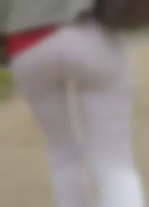 Lovely ass in white tight pants