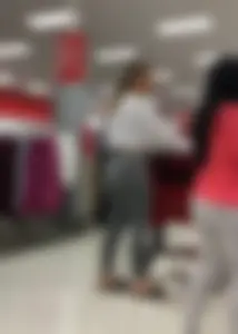 Sexy lady shopping at Target with a big ass in grey leggings