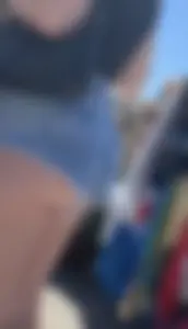 Perfect cheeks falling out of denim shorts