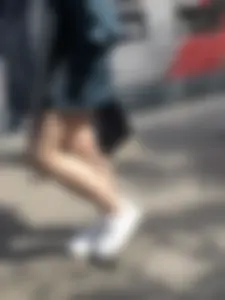 Cute candid girl in a dress at the train station