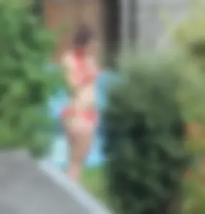 Thick babe in the backyard in red bikini