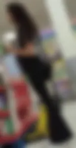 Curly hair babe wearing flares @ Walmart (+ more)