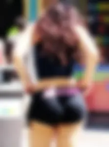 Awesome Candid Bubble Ass in Spandex Mini Shorts, Girl in a Top With Gorgeous Wavy Hair