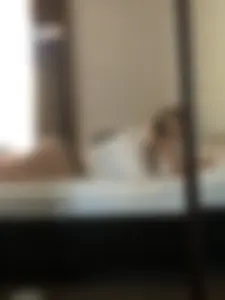 Girl Lying in Bed in front of the Mirror in Panties Selfie