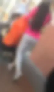 Candid Asian milf with a nice ass in grey leggings