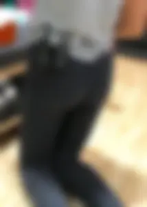 Shoe store employee with a sexy bubble butt in leggings