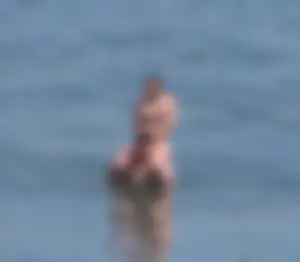 Hilary Duff in purple bikini in Malibu with a great ass and hard nipples