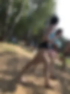 Wet Girls in Swimsuits Walking Towards Water at a Lake Beach Photo Series