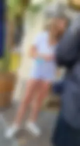 A Sexy Girl in Shorts And Sneakers Street Photos, Beautiful Legs