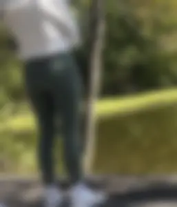 Cute girl in green leggings