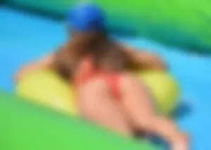 Sexy girls swimming in a pool