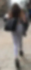 Sexy girl in see through grey leggings showing her thong