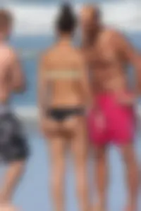 Beach girl out in a bikini with a nice round big booty