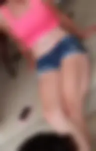 Friend in short shorts showing cheeks and some cleavage